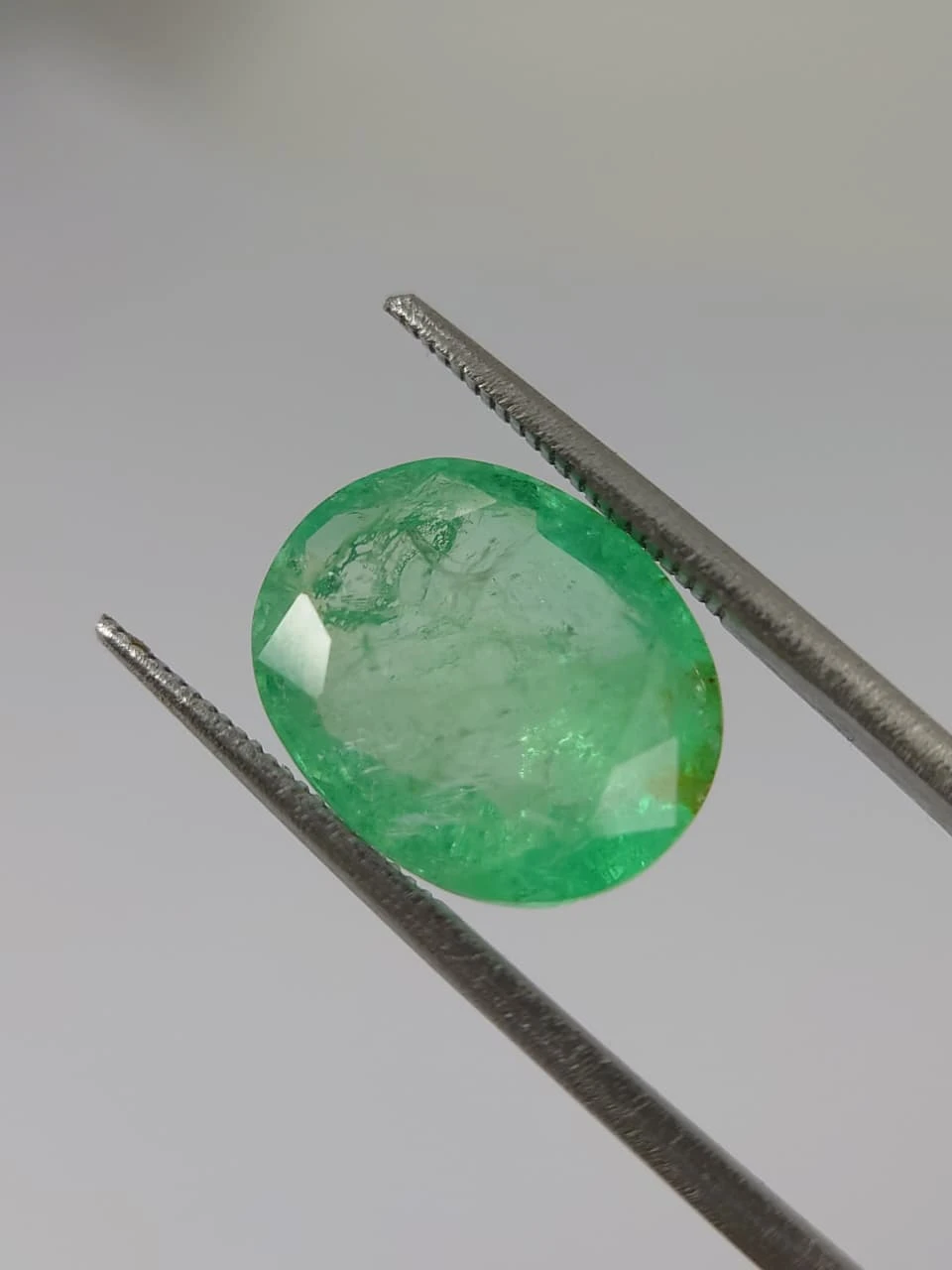 7.7ct Oval Faceted Minor Oiled Panjshir Emerald from Afghanistan — view 2